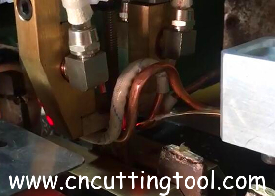 Automatic segments feeding, rotating and brazing machine for saw blade